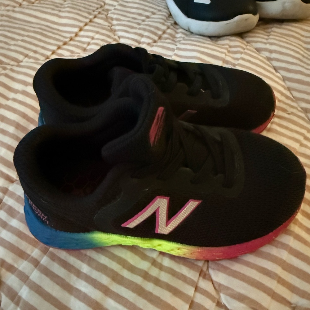 New Balance Kids Black Sneakers with Pink and Rainbow Midsole